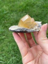 Load image into Gallery viewer, Orange Calcite on Matrix
