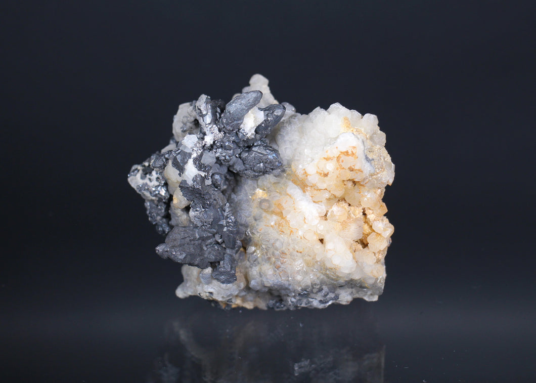 Acanthite and Calcite on Matrix